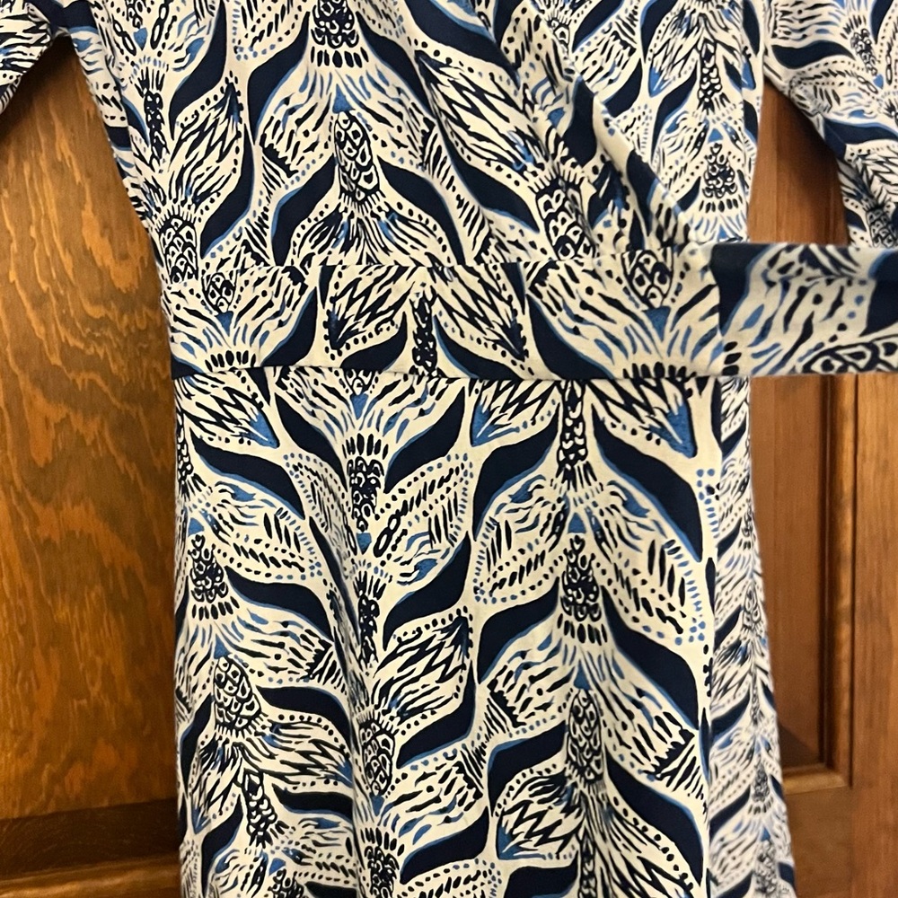Lilly Pulitzer one piece wrap around short romper. - Picture 6 of 8